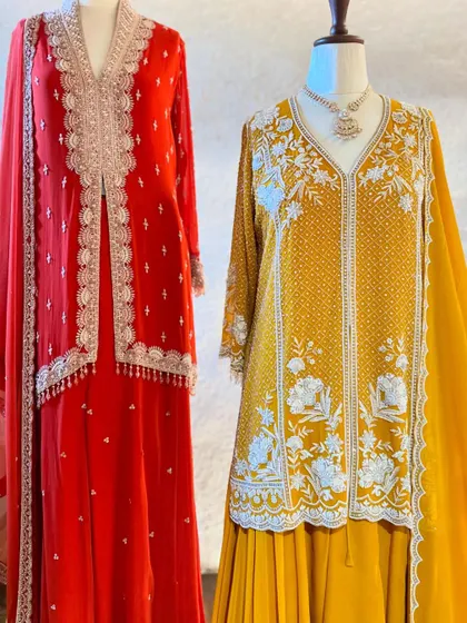 A beautiful contrast of red and mustard yellow. These suits by Jayanti Reddy feature her signature intricate embroidery, making them a sophisticated choice for any celebration.