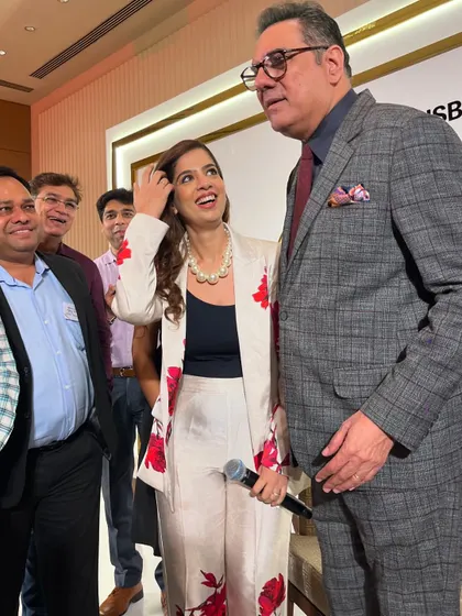 A candid moment of interaction with the iconic Boman Irani at the HSBC Gratitude Gala. Engaging with celebrity guests in a genuine and fun way makes the event memorable for everyone.