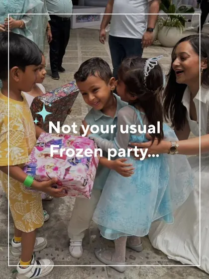 A candid shot of the children and their parents enjoying the party, with the birthday girl in her princess dress. The smiles and hugs show the event was a huge success.