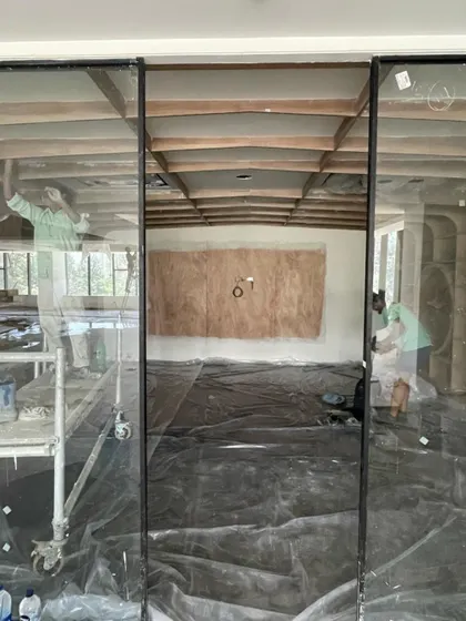 A work-in-progress shot from Heritage Xperiential School. This image shows the interior during construction, with scaffolding and exposed ceilings, offering a glimpse into the process of transforming a site into a learning environment.