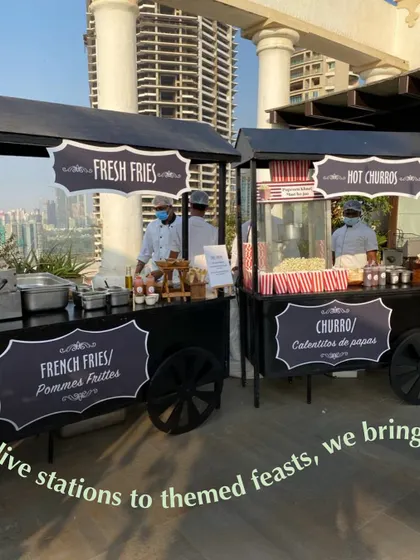 Live food carts are a fantastic addition to any outdoor event or kids' party. Here we have our fresh fries and hot churros stations, serving up delicious treats that guests of all ages love.