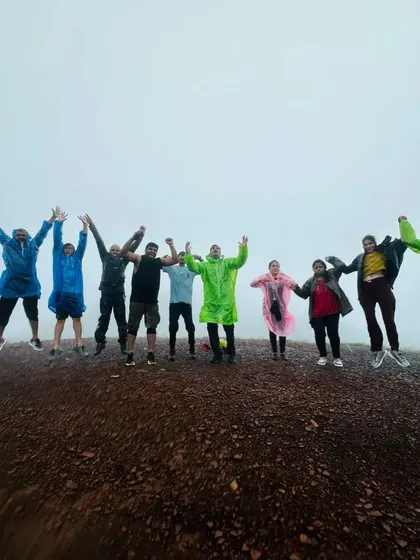 A jumping-for-joy moment at the top of a hill on our Kodachadri trek.
