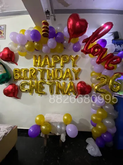 A complete view of the custom birthday balloon wall I designed. It serves as a perfect photo backdrop for the celebration.