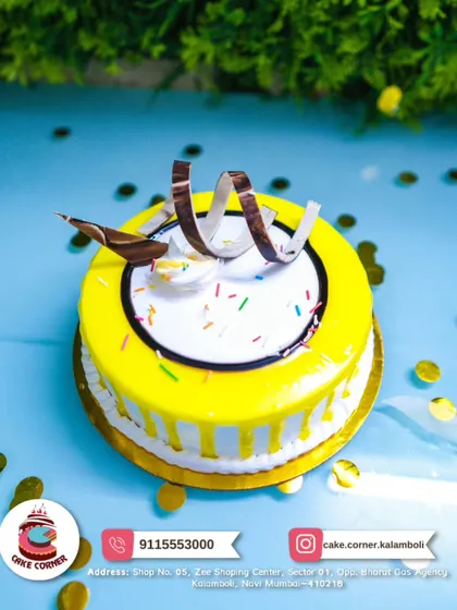 Another view of my vibrant yellow cake, perfect for bringing a bit of sunshine to any party. The simple decorations make it a versatile choice.