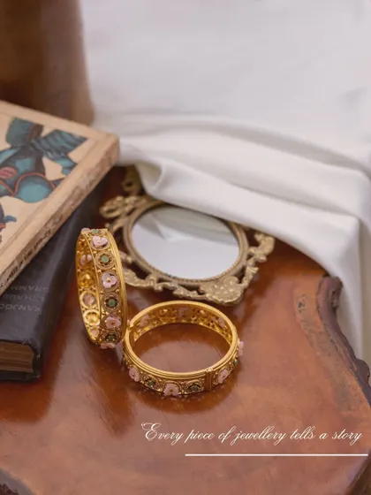 A vintage-inspired product shot for Manjali Jewellers bangles. I used an old book, a classic hand mirror, and soft fabric to create a nostalgic scene that tells a story of heirloom treasures.