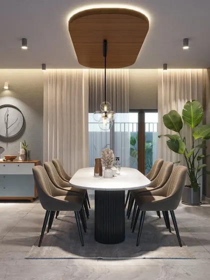 An elegant dining room with a suspended wooden ceiling feature and modern pendant lighting. The neutral color scheme and large plant create a calm and sophisticated environment.