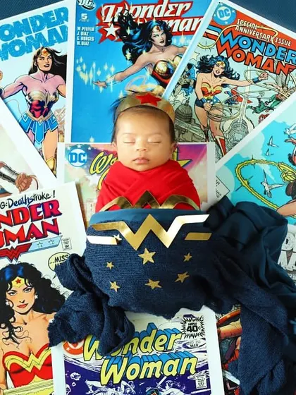 A little hero in the making. This Wonder Woman theme is perfect for a strong baby girl, surrounded by classic comic book covers that celebrate her power.