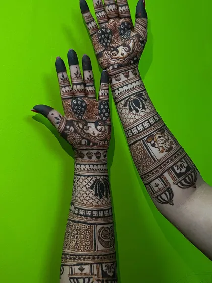 Another view of the full-arm bridal design, showing the different patterns on each arm.
