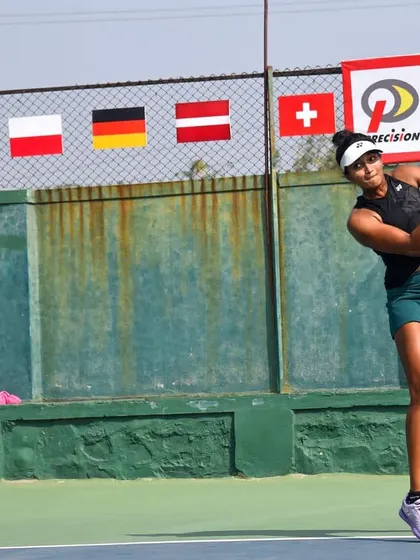 In action during the final of the ITF W25 Solapur. These photos show different aspects of my game under pressure, from hitting a running forehand to maintaining balance on a two-handed backhand.