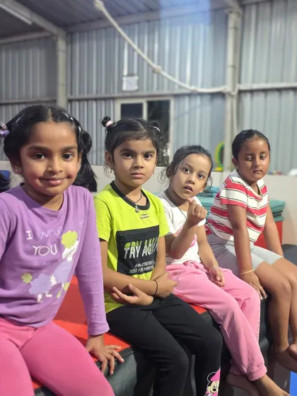 A quick break between drills. The friendships formed at the gym are just as important as the skills learned, and we love seeing our students support one another.