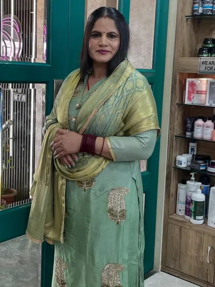 A mother-daughter duo getting ready at our salon. We provided age-appropriate, elegant makeup for both of them for their special family function.