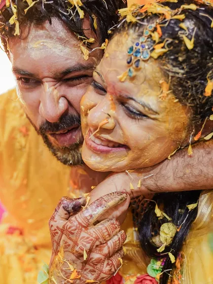 The playful side of love shines brightest during the Haldi. This candid shot of Vishal and Sayli is a perfect example of the fun and unscripted moments we aim to capture.