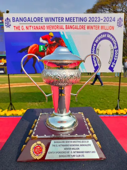 The G. Nityanand Memorial Bangalore Winter Million trophy, a grand silver cup with intricate engravings.