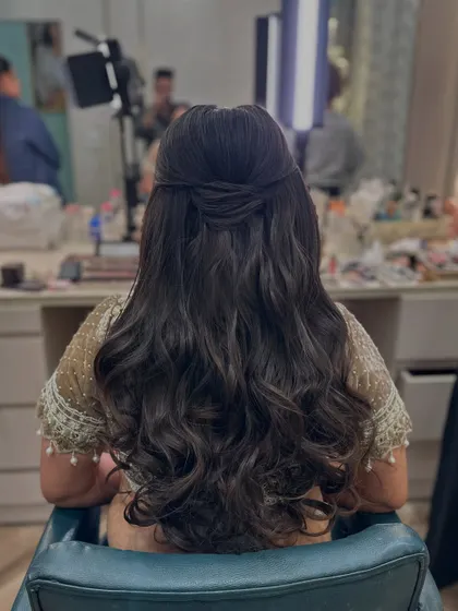 Another shot of the soft and natural half-updo, a perfect 'no-fuss' party look.