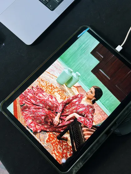 The post-production process. Reviewing selects and edits on my tablet to make sure the final images are perfect.