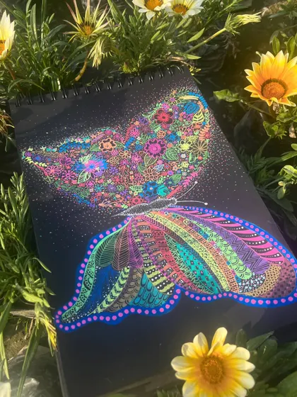 The completed butterfly artwork, symbolizing freedom and transformation.