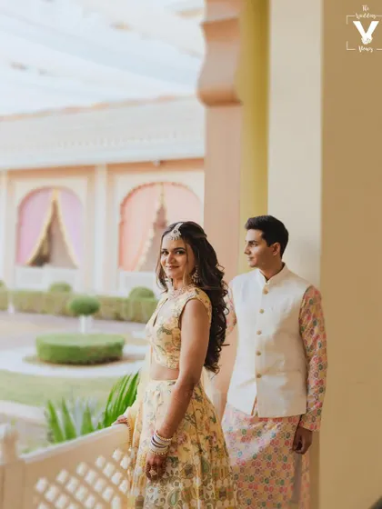 A lovely portrait of the couple on a balcony at the Indana Palace in Jodhpur. The architectural details and soft light create a romantic and regal setting for their pre-wedding photos.