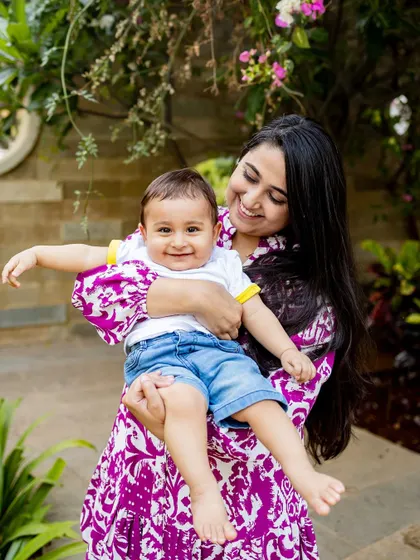 This beautiful black and white portrait of a mother and her happy baby boy is full of life and joy. I love capturing these moments in the garden.