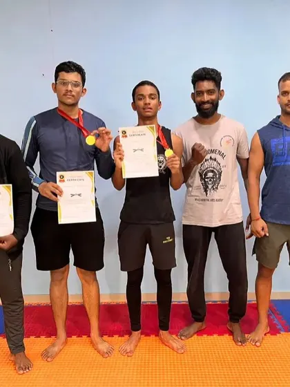 Team Phenomenal after a successful night at the inter-club championship, securing two gold medals and a strong performance in a boxing bout.