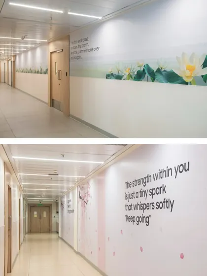 Inspirational quotes and gentle graphics are integrated into the design of hospital corridors. These elements provide moments of encouragement and emotional support, reinforcing the healing mission of the space.