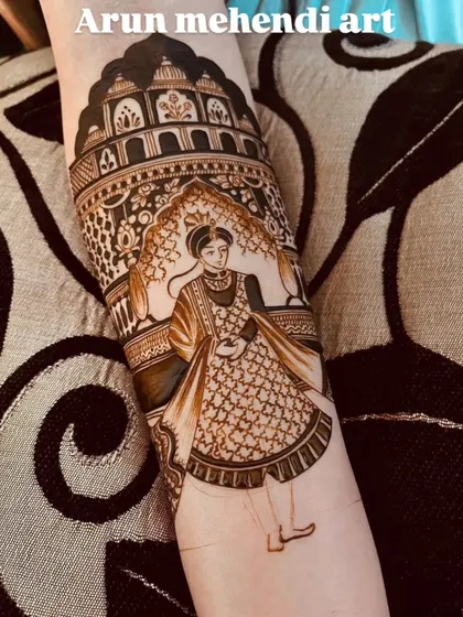 A beautiful portrait of a groom in his royal attire, covering the forearm.