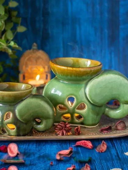 Here are the two sizes of my ceramic elephant oil burners, styled together on a decorative tray. They make a lovely pair and a thoughtful gift for anyone who enjoys aromatherapy and handcrafted decor.
