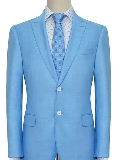 A bright sky blue suit that is perfect for summer events. The color is refreshing and the cut is modern and clean.