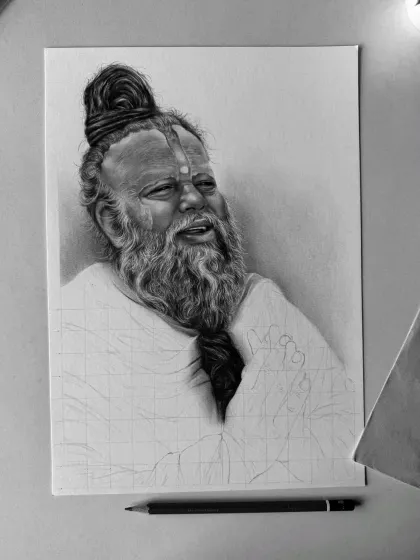 Another stage in the drawing of Premanand Govind Maharaj. In this image, more of his face and beard are shaded, showing the gradual process of building up realistic textures.
