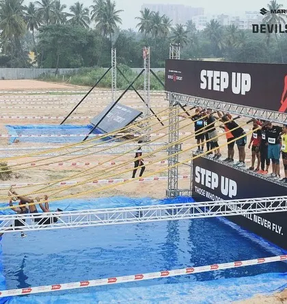 The 'Step Up' obstacle requires balance and explosive power. My OCR coaching includes drills to improve agility and confidence for challenges that test you over water and at heights.