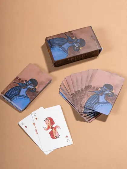 A clean, top-down shot of a deck of playing cards, fanned out to show the design. This is a classic and effective way to showcase the product for e-commerce.