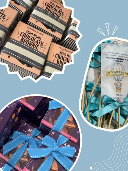 A sneak peek of the goodies for a baby boy's first birthday return favors. I used custom-designed tags and ribbons to match the hot air balloon theme.