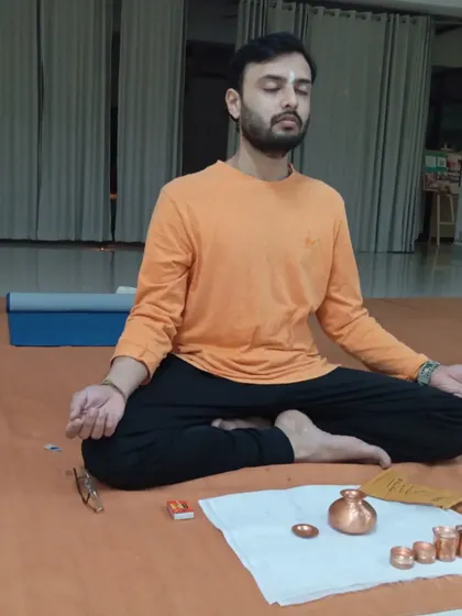 A participant sits in meditation before beginning the Bhuta Shuddhi process, a profound yogic practice to cleanse the five elements.