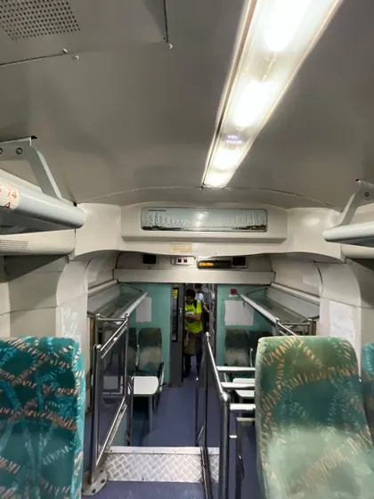The view from one end of the train coach to the other, showing the unique split-level layout.