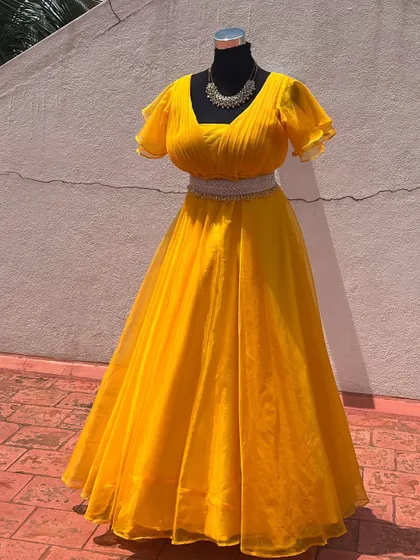 This sunny yellow gown is perfect for a Haldi ceremony or a daytime summer event.