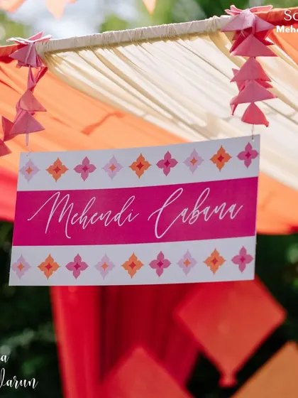 Welcome to the Mehendi Cabana. Even the smallest signs are an opportunity to tell a story. This vibrant, custom-designed sign adds a touch of fun and personality to the celebration.
