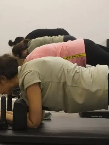 Planks on the reformer box. This variation adds an element of instability, forcing your core to work even harder.