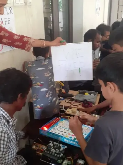 We fixed it! A moment of celebration at our Chennai workshop. The joy of a successful repair is best when shared with the community.