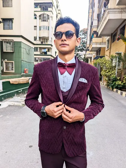 Another look at the wine maroon tuxedo, a standout piece from my men's formal wear collection.