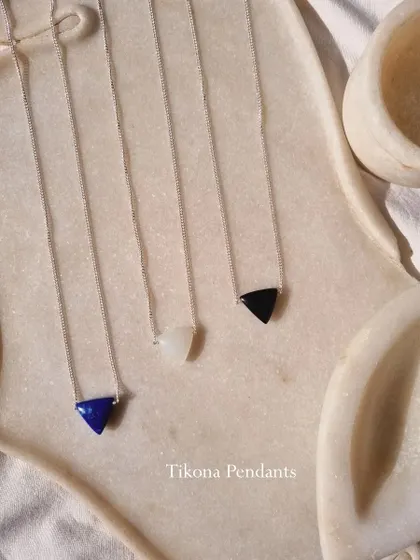 A collection of my Tikona pendants for men.