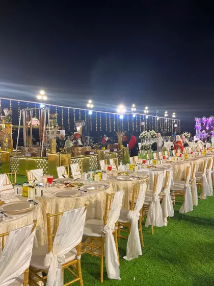 The full scope of an outdoor dining setup.