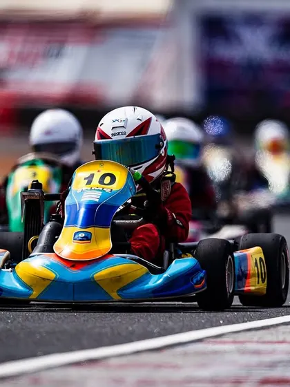 Our Micro driver in the number 10 kart, leading a pack of racers.