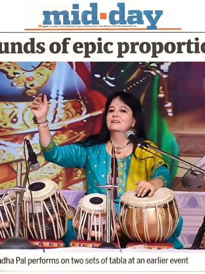 A Mid-day newspaper clipping titled 'Sounds of epic proportion', featuring a photo of me performing on two sets of tablas at an earlier event, a technique I often use in my conceptual shows.