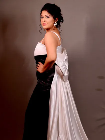 A black and white gown look for actress Meghana Shankarappa for the Zee Kutumbha Awards red carpet.