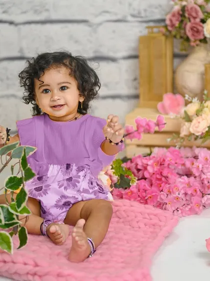 A duplicate of image 13, a lovely first birthday portrait.