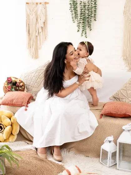 A sweet kiss from baby to mama. These unscripted moments of affection are simply the best.