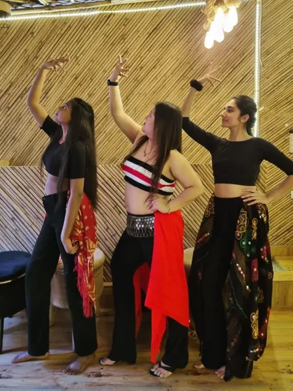 Another dynamic pose from our expressive dancers. We teach how to use the entire body to create beautiful lines and shapes.
