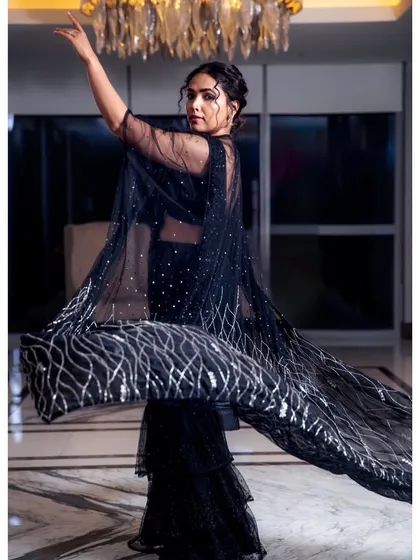 A dynamic shot of Anupama, showing the beautiful movement of the sheer, embroidered cape. This outfit was a labor of love and a true milestone for me.