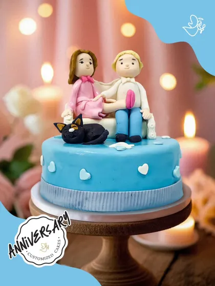 This anniversary cake for Vishal and Yamini in Pamposh Enclave even includes their furry friend. We love adding these personal details, like a beloved pet snoozing at your feet, to make your cake topper extra special.