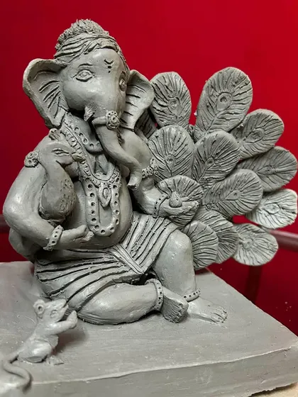 A full view of the hand-sculpted Ganesha idol, made from shadu clay.