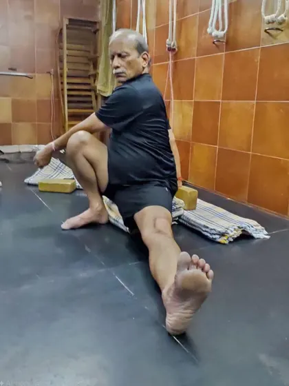 A variation of a lunge pose, demonstrating deep stretching of the hip flexors and quadriceps.